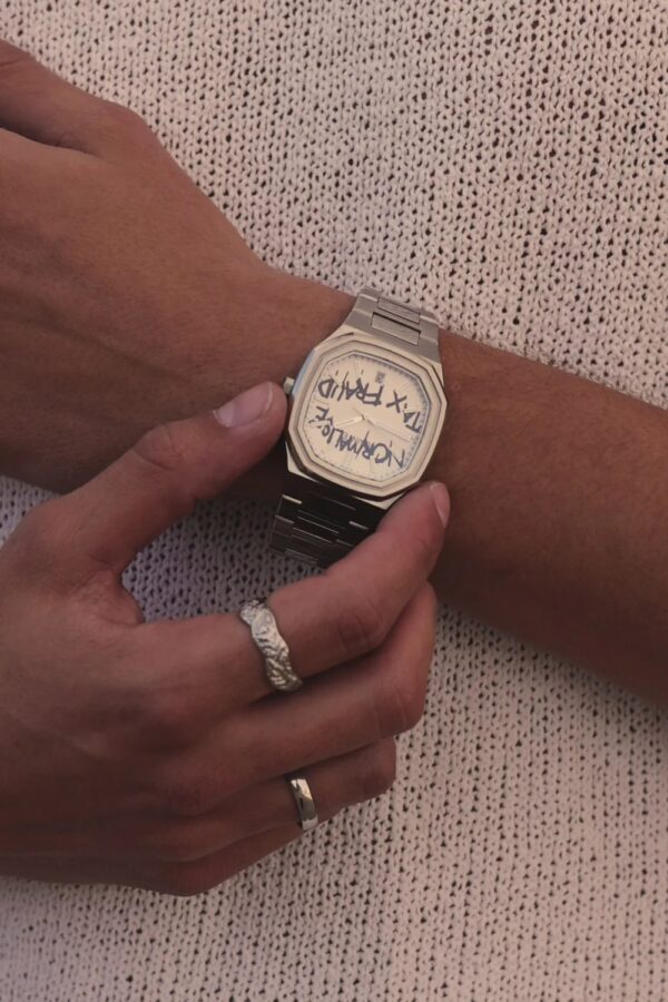 Cainte Cluade TXT Watch Tax Fruad Quartz