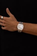 Cainte Cluade TXT Watch Tax Fruad Quartz